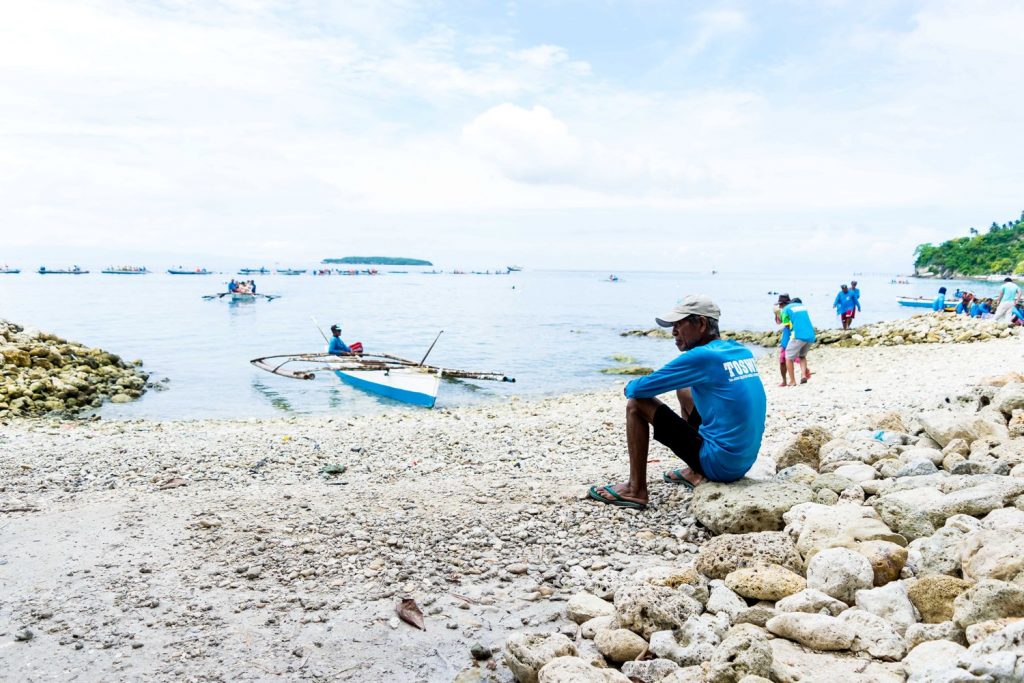 Oslob Man Sits By The Shore