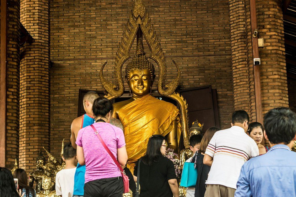 Devotees Praying to Buddha