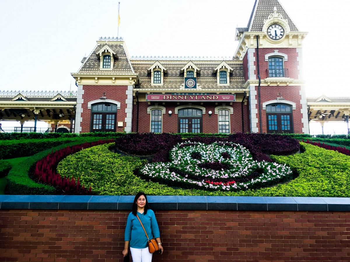 My Mom Posing in Front of Mickeys Castle at Disneyland