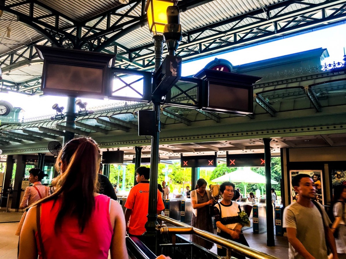 Hong Kong Disneyland turnstiles and ticket station 